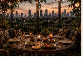 A long table laid out for a group on the terrace