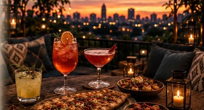Drinks and shared plates on the terrace at golden hour